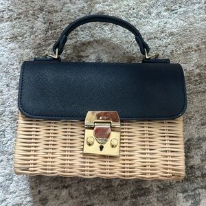Elegant Black and Tan Woven Handbag